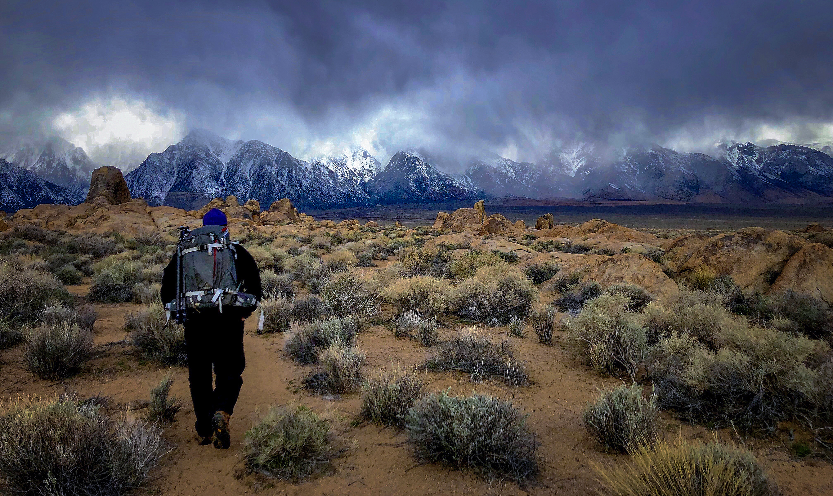 Walking in the Alabama Hills during a stormy day