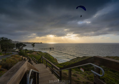 A Para-glider enjoying the last rays of sunshine during a sunset in La Jolla, California.