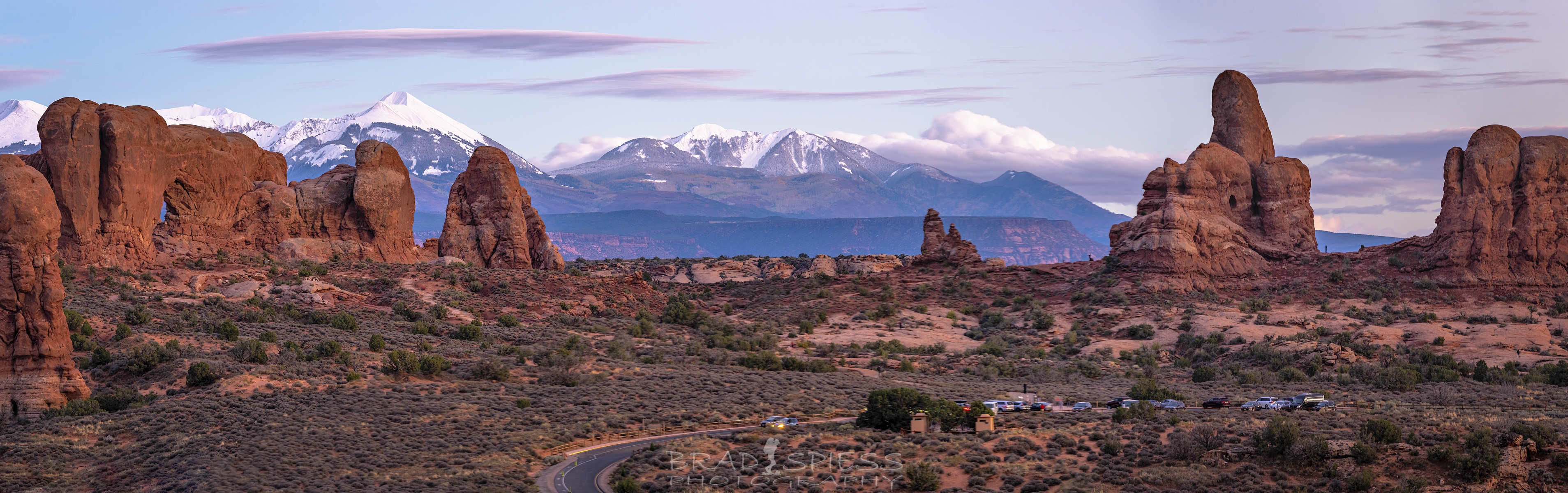 A more detailed panorama looking towards the La Sal Mountains behind the rocks in Arches National Park